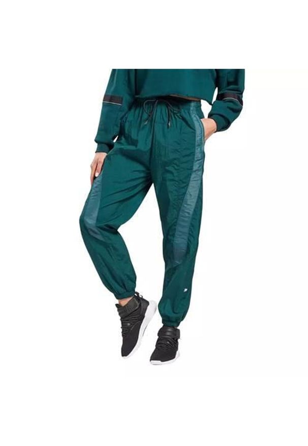 Spodnie sportowe damskie Reebok Shiny Woven Xs. Kolor: zielony. Długość: długie