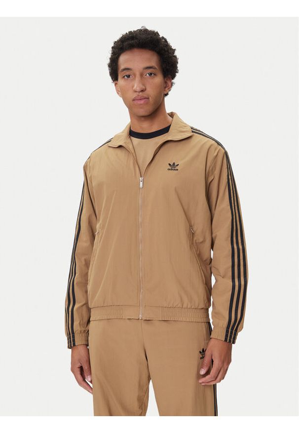 Adidas - adidas Bluza adicolor Woven Firebird JY1333 Beżowy Loose Fit. Kolor: beżowy. Materiał: syntetyk