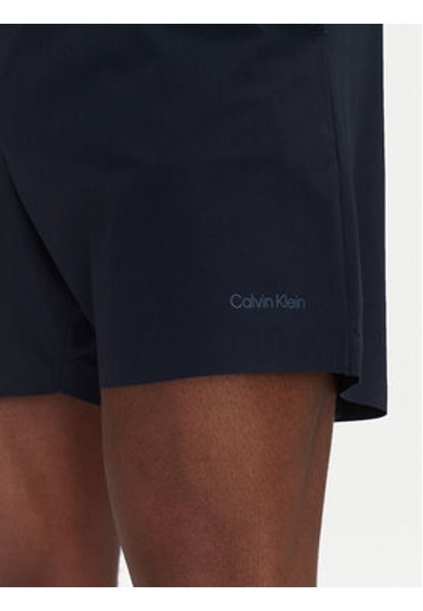 Calvin Klein Swimwear Szorty kąpielowe KM0KM01118 Granatowy Regular Fit. Kolor: niebieski. Materiał: syntetyk