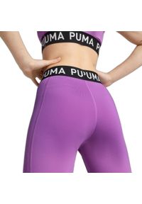 Damskie legginsy Puma Strong. Kolor: fioletowy, wielokolorowy, różowy. Sport: bieganie, fitness #1