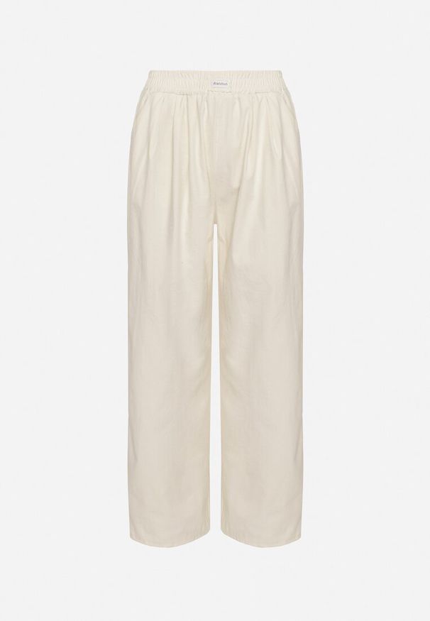 Born2be - Jasnobeżowe Szerokie Spodnie z Bawełną Wysokim Stanem i Naszywką Nannirea. Okazja: na co dzień. Stan: podwyższony. Kolor: beżowy. Materiał: bawełna. Wzór: aplikacja. Styl: casual, elegancki, klasyczny