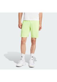 Adidas - Szorty Tennis Ergo. Kolor: żółty. Materiał: materiał. Sport: tenis
