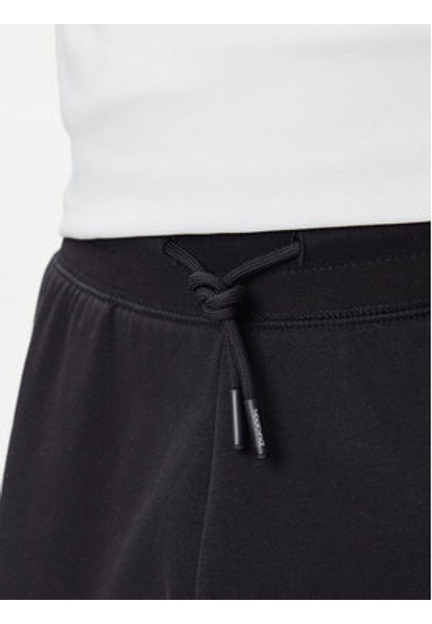 The North Face Spodnie dresowe Essential NF0A8C1F Czarny Relaxed Fit. Kolor: czarny. Materiał: syntetyk