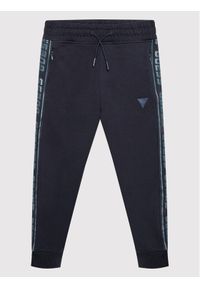 Guess Spodnie dresowe L2YQ48 K6ZS1 Granatowy Regular Fit. Kolor: niebieski. Materiał: bawełna #1