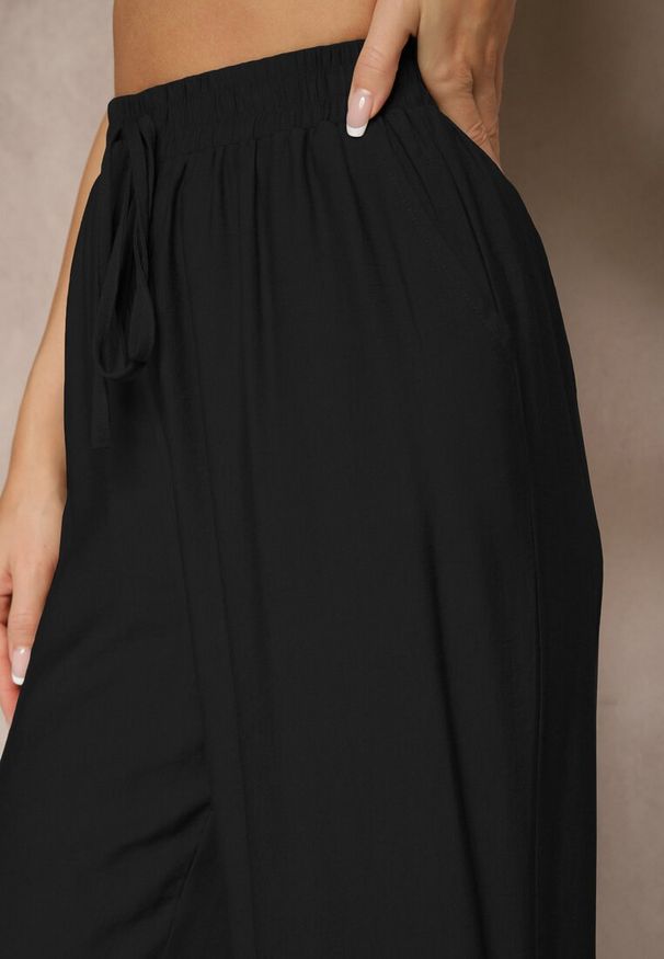 Renee - Czarne Spodnie o Szerokim Kroju High Waist z Wiązaniem Fenalin. Okazja: na spacer, na co dzień, na imprezę. Stan: podwyższony. Kolor: czarny. Styl: elegancki, casual