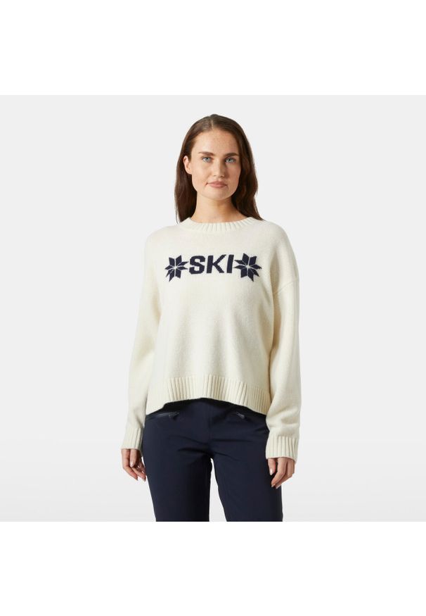 Damski sweter z dzianiny Helly Hansen Bliss. Kolor: wielokolorowy, biały, beżowy. Materiał: dzianina. Sezon: zima. Sport: wspinaczka, narciarstwo