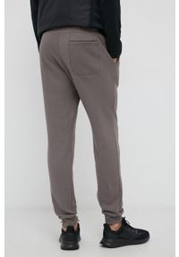 Guess Spodnie bawełniane męskie kolor szary gładkie. Kolor: szary. Materiał: bawełna. Wzór: gładki #4