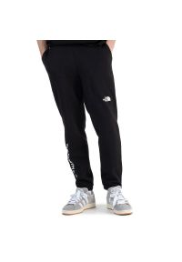 Spodnie The North Face Tech 0A5312WZY1 - czarne. Kolor: czarny. Materiał: bawełna, materiał, nylon, poliester