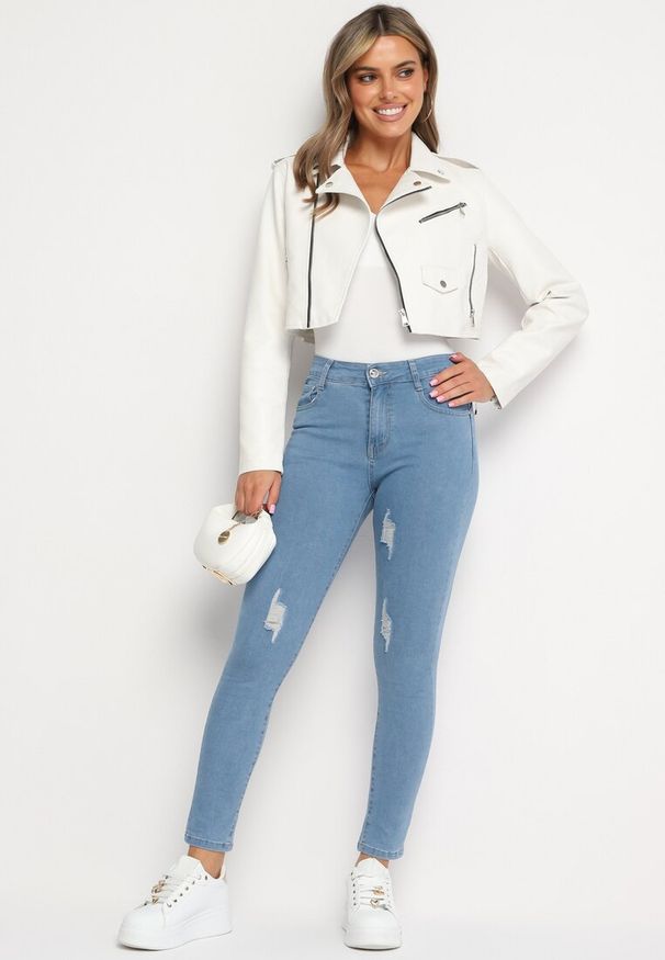 Born2be - Niebieskie Dopasowane Jeansy z Dziurami i Przetarciami Eviraes. Okazja: na co dzień. Kolor: niebieski. Styl: elegancki, casual