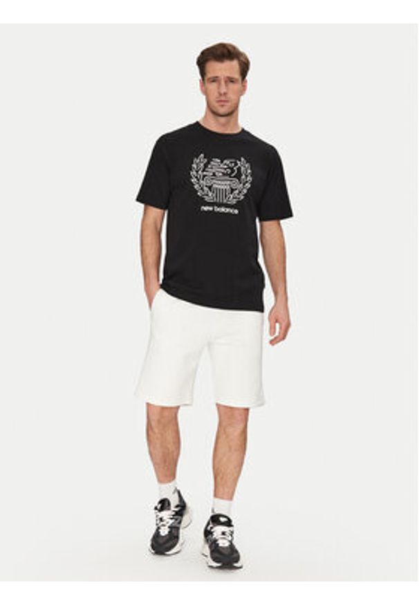 New Balance T-Shirt MT51974 Czarny Relaxed Fit. Kolor: czarny. Materiał: bawełna