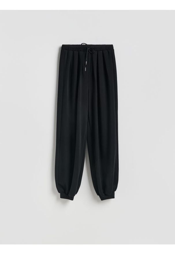 Reserved - Spodnie balloon - czarny. Kolor: czarny. Materiał: dzianina, wiskoza