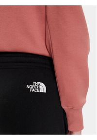 The North Face Spodnie dresowe Standard NF0A5ID4 Czarny Regular Fit. Kolor: czarny. Materiał: bawełna