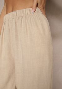 Renee - Beżowe Spodnie Joggery High Waist ze Ściągaczami Korilanea. Okazja: na co dzień. Stan: podwyższony. Kolor: beżowy. Styl: elegancki, casual