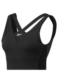 Koszulka treningowa damska Reebok Studio Mediumimpact. Kolor: czarny. Długość rękawa: bez rękawów. Sport: fitness, bieganie #1