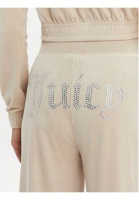 Juicy Couture Spodnie dresowe Audree JCWBJ23334 Beżowy Loose Fit. Kolor: beżowy. Materiał: syntetyk