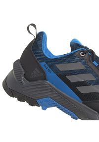Adidas - Buty adidas EastRail 2 R.Rdy M S24009 czarne niebieskie. Zapięcie: sznurówki. Kolor: niebieski, wielokolorowy, czarny. Materiał: syntetyk, guma. Szerokość cholewki: normalna #7