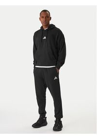 Adidas - adidas Spodnie dresowe Essentials Feel Cozy JE3854 Czarny Regular Fit. Kolor: czarny. Materiał: bawełna #4