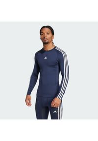 Adidas - Koszulka TECHFIT Compression Training 3-Stripes Long Sleeve. Kolor: niebieski. Materiał: materiał. Długość rękawa: długi rękaw. Technologia: Techfit (Adidas). Sport: fitness