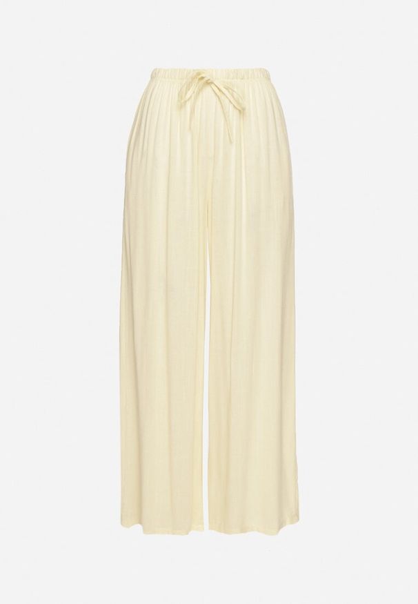 Born2be - Jasnożółte Spodnie z Szerokimi Nogawkami i Gumką w Pasie Helnena. Okazja: na spacer, na co dzień. Kolor: żółty. Materiał: wiskoza, materiał. Styl: casual, klasyczny