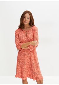 bonprix - Sukienka z krepy z dżerseju, z nadrukiem. Kolor: pomarańczowy. Materiał: jersey. Wzór: nadruk #1