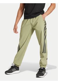 Adidas - adidas Spodnie dresowe Future Icons 3-Stripes IW8549 Zielony Regular Fit. Kolor: zielony. Materiał: syntetyk