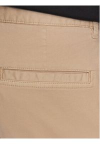 Hugo Spodnie materiałowe 50484022 Beżowy Slim Fit. Kolor: beżowy. Materiał: materiał