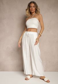 Renee - Jasnobeżowe Spodnie z Wiskozy High Waist o Szerokim Kroju Divlise. Okazja: na co dzień. Stan: podwyższony. Kolor: beżowy. Materiał: wiskoza. Styl: elegancki, casual