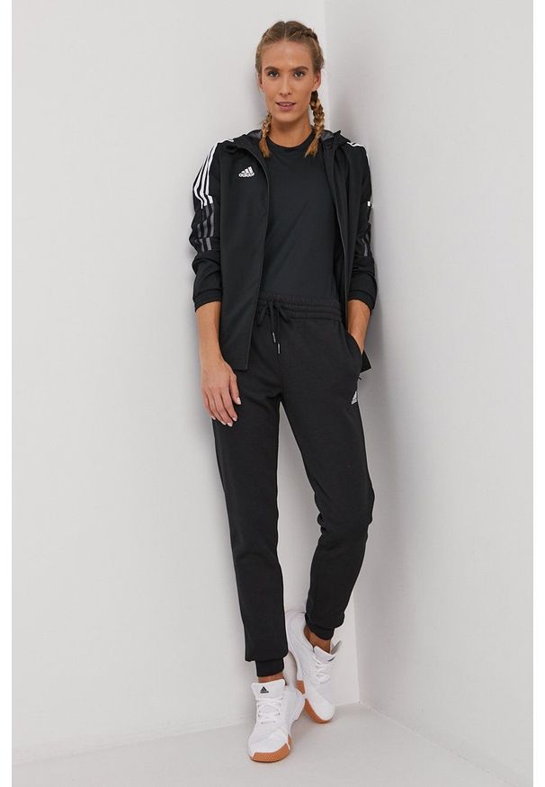 Adidas - adidas Spodnie damskie kolor czarny gładkie. Kolor: czarny. Materiał: bawełna. Wzór: gładki