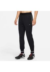 Spodnie męskie treningowe Nike Strike Jogging Pants czarne. Kolor: wielokolorowy, czarny, biały. Sport: bieganie