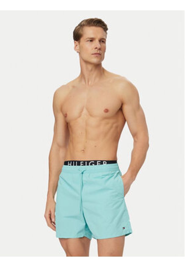 TOMMY HILFIGER - Tommy Hilfiger Szorty kąpielowe UM0UM03749 Turkusowy Regular Fit. Kolor: turkusowy. Materiał: syntetyk