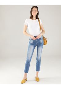 Unisono - JEANSY Z POSTRZĘPIENIEM. Materiał: jeans. Styl: klasyczny