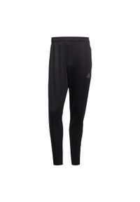 Adidas - Spodnie adidas Tiro Track Pant CU M GN5490. Kolor: czarny