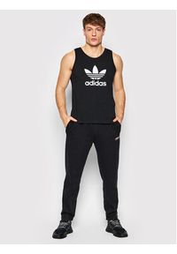 Adidas - adidas Spodnie dresowe Adventure HF4771 Czarny Regular Fit. Kolor: czarny. Materiał: bawełna, dresówka #2