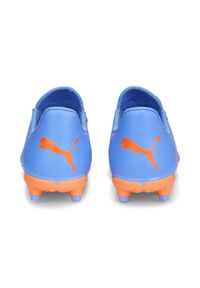 Buty piłkarskie dla dzieci Puma Future Play Fgag JR. Zapięcie: sznurówki. Kolor: wielokolorowy, pomarańczowy, żółty, biały, niebieski. Materiał: materiał, syntetyk. Szerokość cholewki: normalna. Sport: piłka nożna