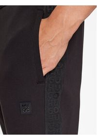 Hugo Spodnie dresowe Dembos 50511723 Czarny Regular Fit. Kolor: czarny. Materiał: bawełna #4