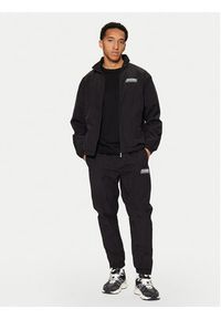 Karl Kani Spodnie dresowe Sport Patch Essential 60030077 Czarny Relaxed Fit. Kolor: czarny. Materiał: syntetyk #5