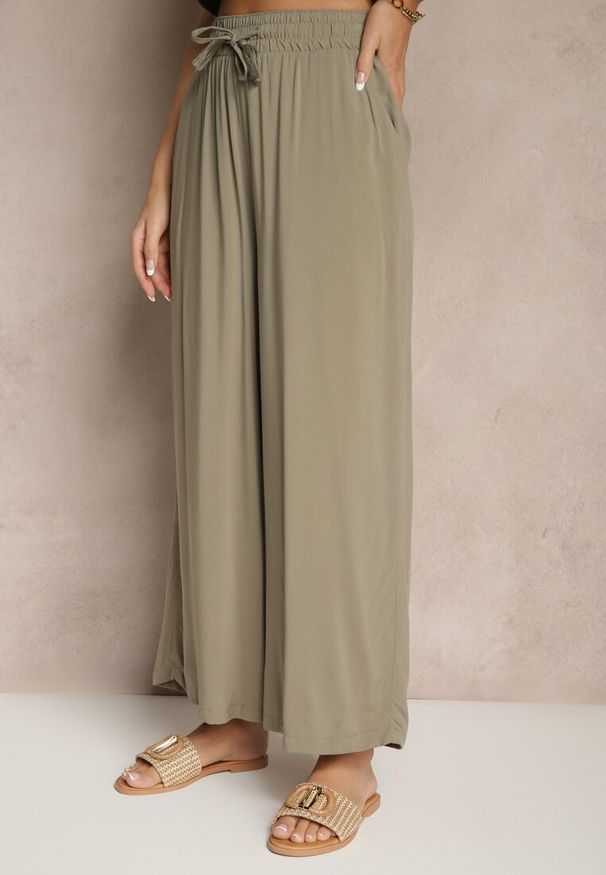 Renee - Ciemnozielone Szerokie Spodnie z Wiskozy ze Sznurkiem Natisetia. Okazja: na co dzień. Kolor: zielony. Materiał: wiskoza. Styl: casual, elegancki