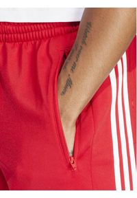 Adidas - adidas Spodnie dresowe adicolor Classics Adibreak IM8221 Czerwony Regular Fit. Kolor: czerwony. Materiał: syntetyk #5