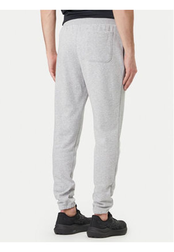 Under Armour Spodnie dresowe UA Rival 6014638 Szary Regular Fit. Kolor: szary. Materiał: bawełna