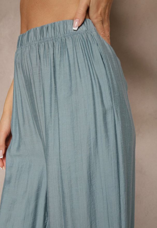Renee - Jasnoniebieskie Spodnie Palazzo o Szerokim Kroju High Waist Lislevia. Okazja: na co dzień. Stan: podwyższony. Kolor: niebieski. Styl: casual, elegancki