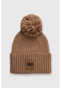 Ugg - UGG czapka z domieszką wełny kolor brązowy z grubej dzianiny. Kolor: brązowy. Materiał: wełna, dzianina