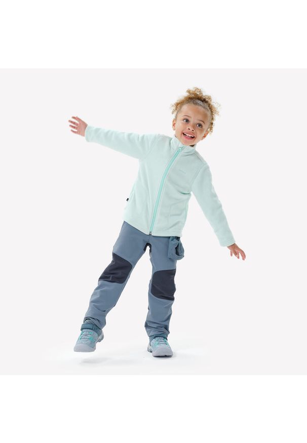 quechua - Spodnie softshell turystyczne dla dzieci Quechua MH900. Kolor: wielokolorowy, niebieski, szary. Materiał: softshell. Sezon: lato. Sport: turystyka piesza