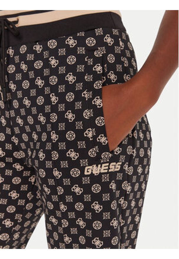 Guess Spodnie dresowe V5YB20 KB212 Czarny Regular Fit. Kolor: czarny. Materiał: syntetyk