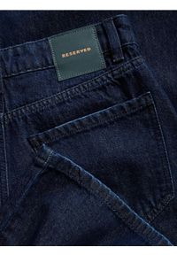 Reserved - Jeansy wide leg - granatowy. Kolor: niebieski