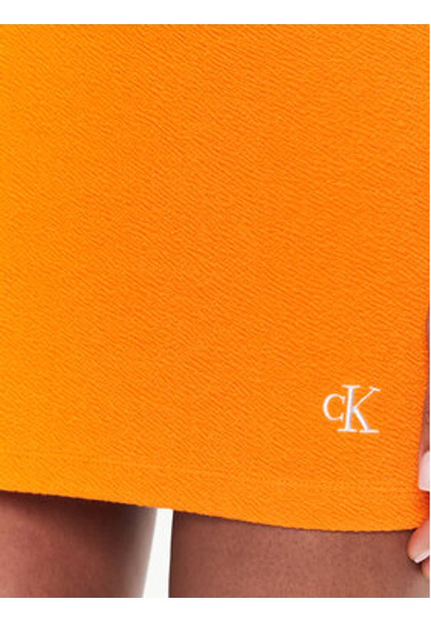 Calvin Klein Jeans Spódnica ołówkowa J20J220795 Pomarańczowy Slim Fit. Kolor: pomarańczowy. Materiał: syntetyk