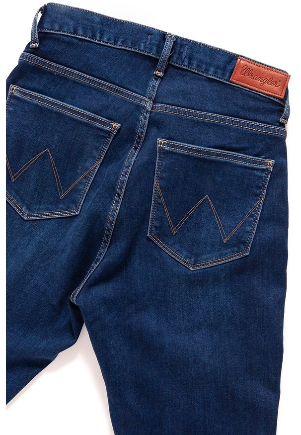 Wrangler - WRANGLER HIGH SKINNY COSY FEEL W27HRL21L 112128114. Stan: podwyższony. Wzór: aplikacja, jednolity
