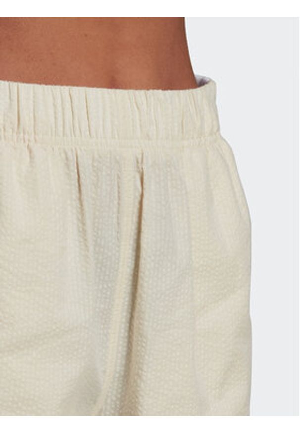 Adidas - adidas Spodnie dresowe adicolor lassics Poplin Track HL9309 Écru Regular Fit. Materiał: bawełna
