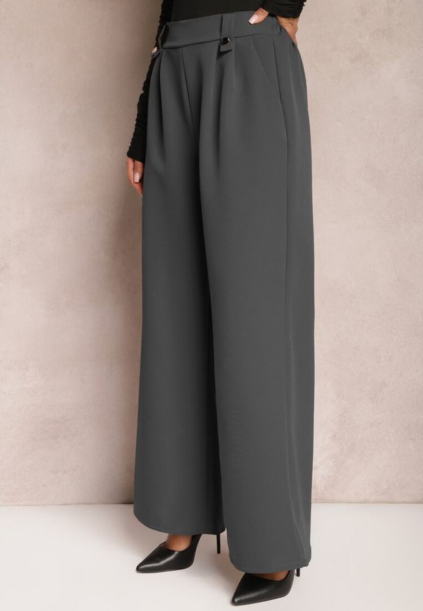Renee - Ciemnoszare Eleganckie Spodnie Dzwony z Ozdobnymi Patkami w Pasie Nattas. Stan: podwyższony. Kolor: szary. Styl: elegancki