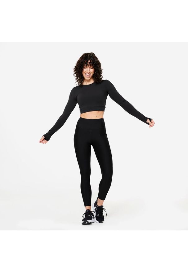 DOMYOS - Koszulka fitness damska Domyos crop top długi rękaw. Kolor: czarny. Materiał: materiał, elastan, poliester. Długość rękawa: długi rękaw. Długość: długie. Sport: fitness