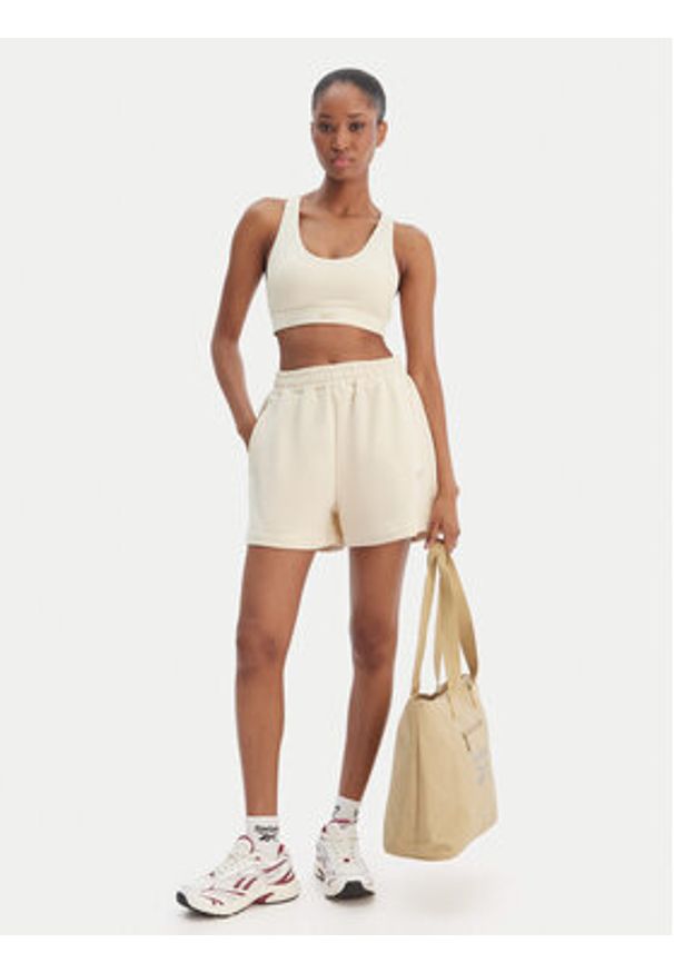 Reebok Szorty sportowe Reebok x Ewa Chodakowska Jula RK25623CCW Beżowy Regular Fit. Kolor: beżowy. Materiał: syntetyk